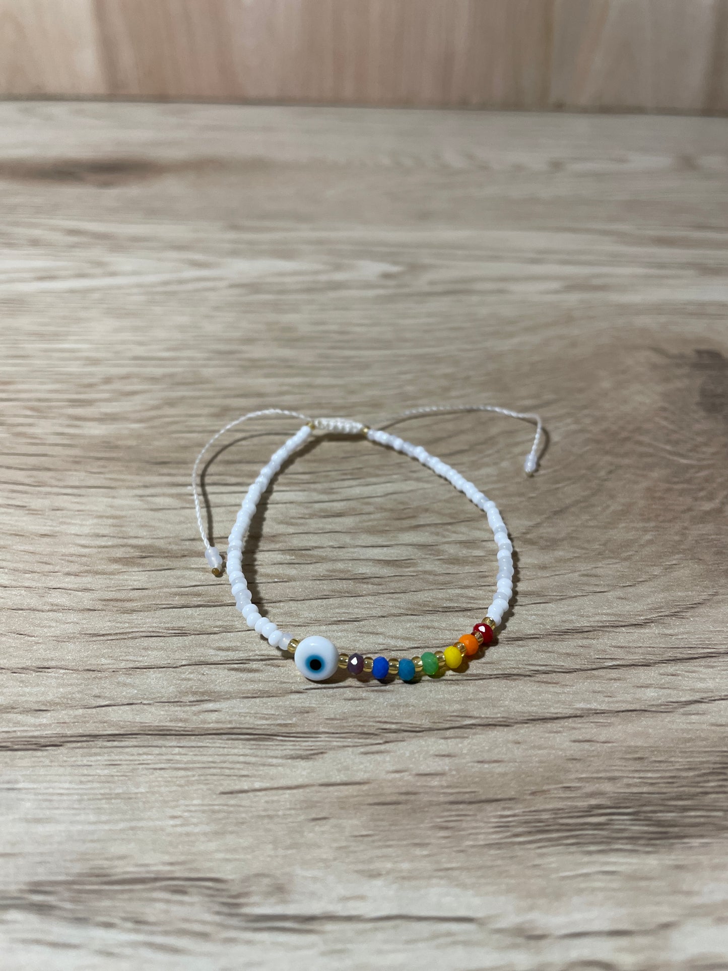 White Adult "Evil Eye" Bracelet with Chakra Colors