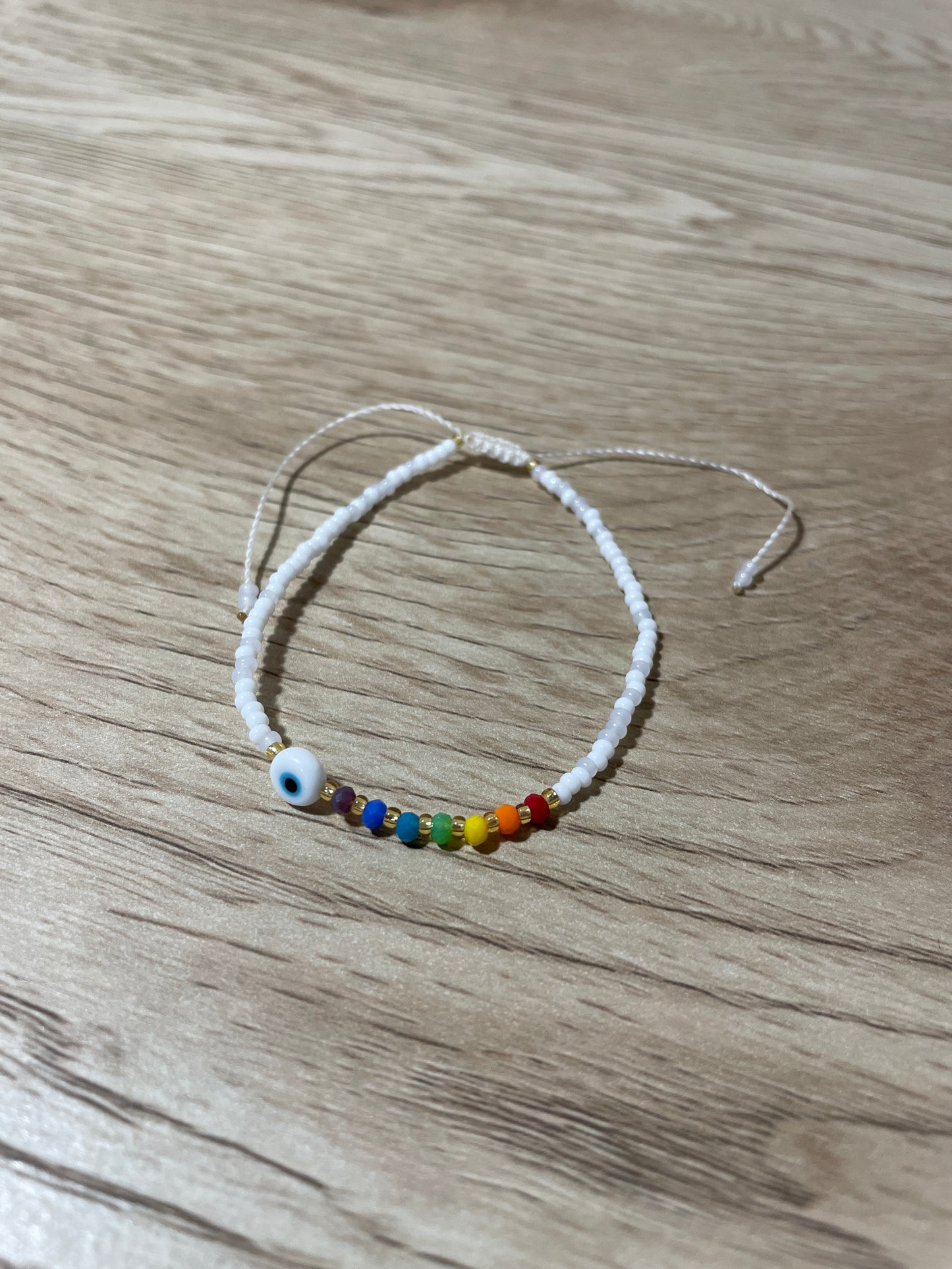 White Adult "Evil Eye" Bracelet with Chakra Colors